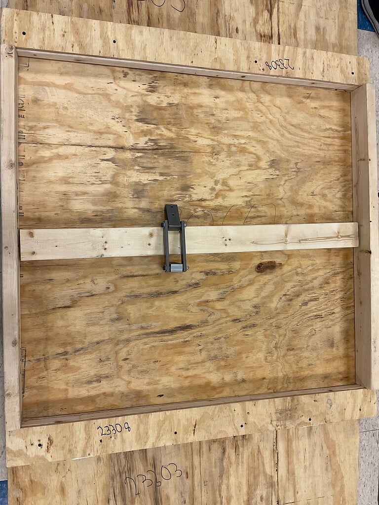 ANS Charge Station Pivot Hinge assembly on wooden charge station