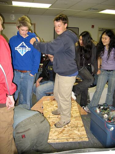Alex being used as a test weight for the ramps lifting a robot, 2007 - Rack n Roll