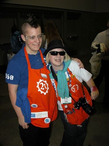 Alex and Zoe at some robotics event