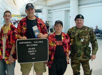 airport- pose with the guard-sm.jpg