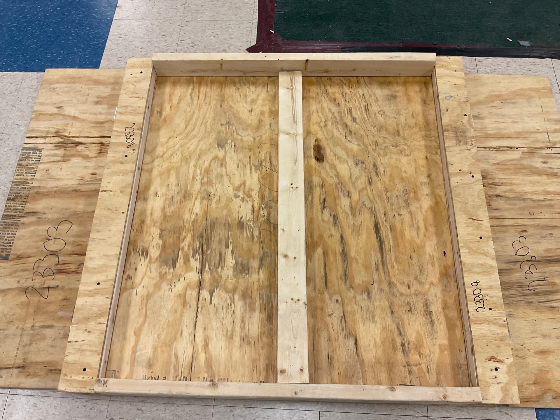 ANS Charge Station Pivot Hinge assembly on wooden charge station